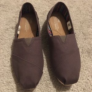Brand new, never worn TOMS classic, size 7.5
